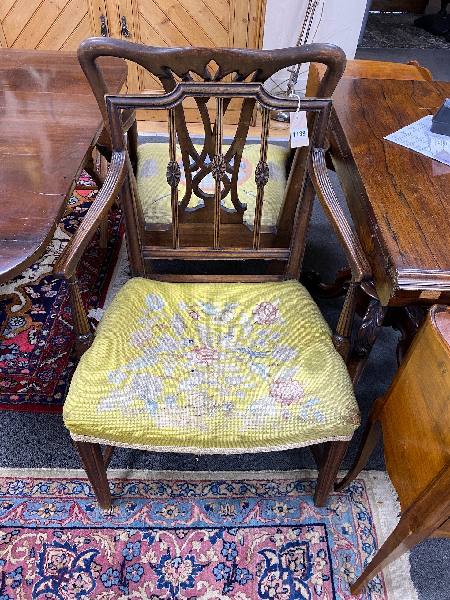 A Chippendale style mahogany carver and a Hepplewhite style mahogany carver